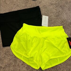 Athleta Black and Neon Yellow Athletic Shorts